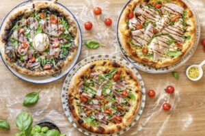 Les Secrets d’une Pizza Parfaite : Guide des Ingrédients et Techniques Utilisés Chez La Bottega